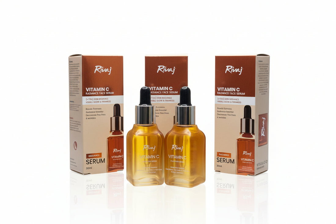 Two bottles of Rivaj Vitamin C serum with their boxes on a white background